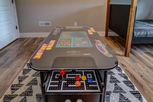 rec room featuring hardwood / wood-style floors