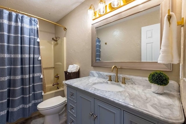 full bathroom featuring vanity, toilet, a textured ceiling, and shower / tub combo with curtain