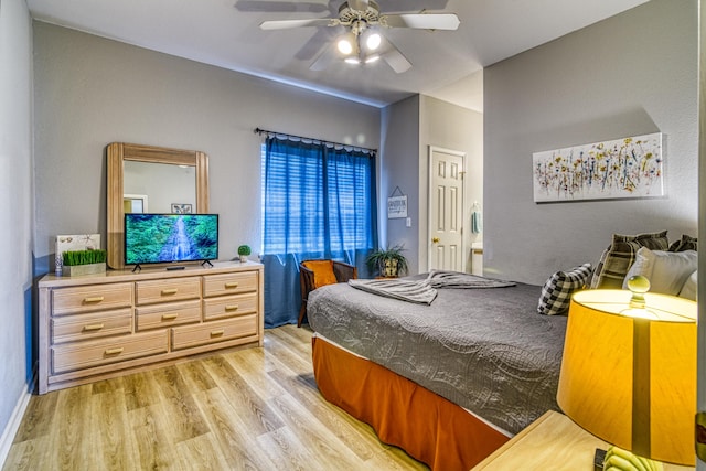 bedroom featuring a ceiling fan and light wood-style flooring