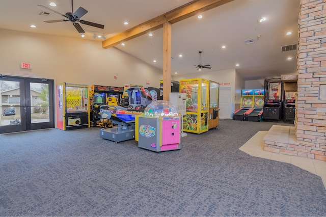 playroom featuring carpet, ceiling fan, beam ceiling, french doors, and high vaulted ceiling