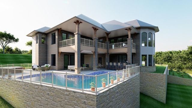 rear view of house featuring a balcony, a fenced in pool, and a patio area