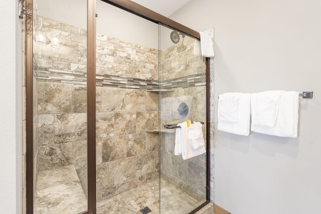 bathroom with an enclosed shower