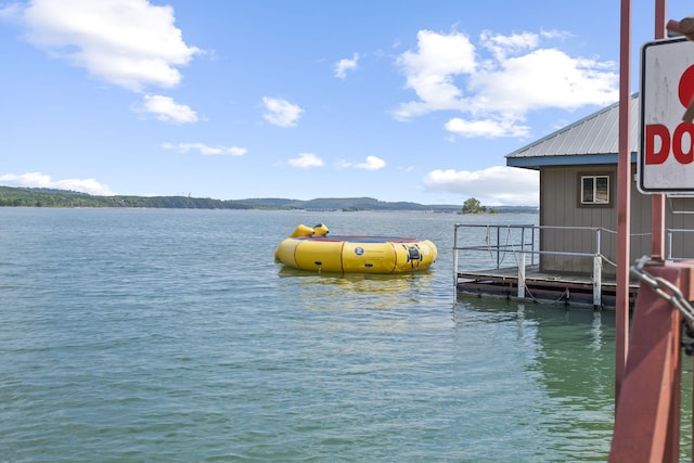 view of dock with a water view