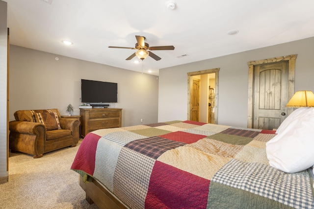 bedroom with light carpet and ceiling fan