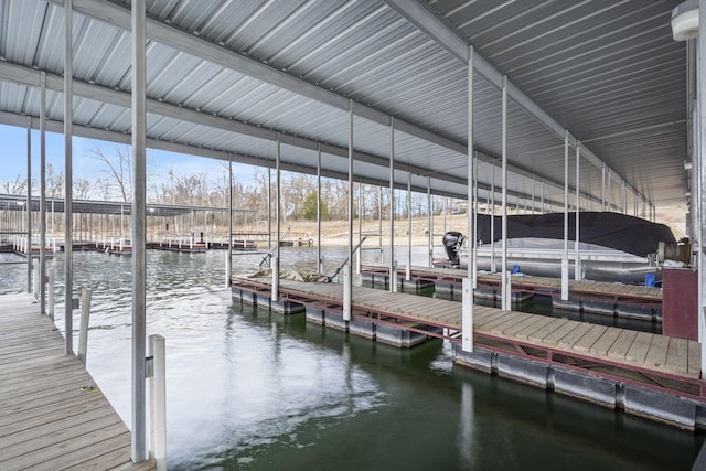 dock area featuring a water view