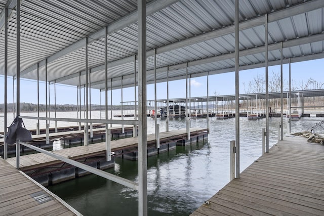 view of dock with a water view