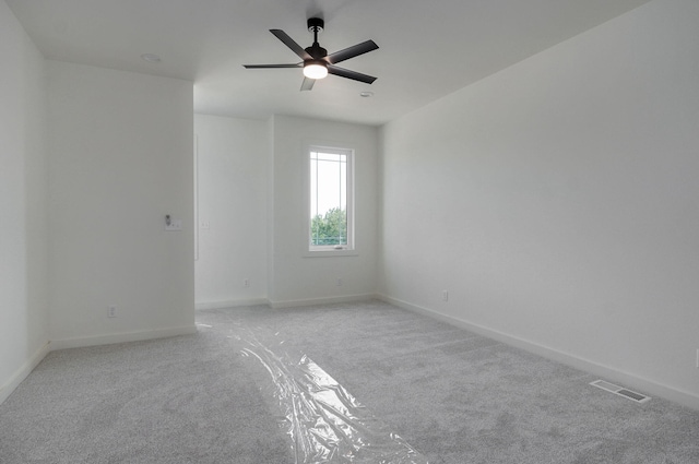 2153 E Will St, Republic, MO 65738 - empty room featuring baseboards, a ceiling fan, visible vents, and light colored carpet