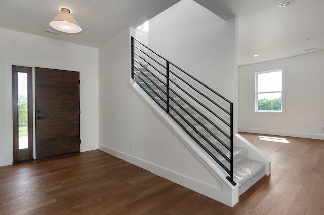 2153 E Will St, Republic, MO 65738 - foyer entrance featuring visible vents, baseboards, wood finished floors, and stairway