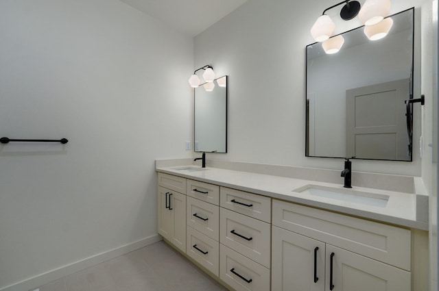 bathroom featuring tile patterned floors and vanity