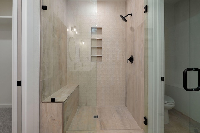 2153 E Will St, Republic, MO 65738 - bathroom featuring toilet and a stall shower