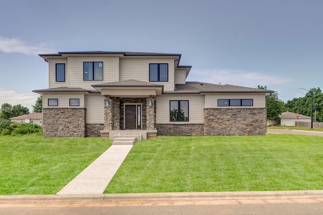 prairie-style home with a front yard