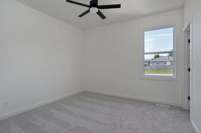2153 E Will St, Republic, MO 65738 - empty room featuring light carpet, visible vents, and baseboards