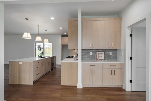 kitchen with dishwasher, light brown cabinets, decorative backsplash, sink, and dark hardwood / wood-style floors