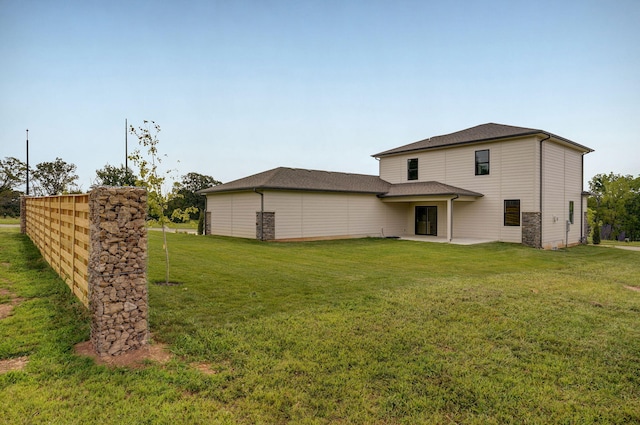 2153 E Will St, Republic, MO 65738 - rear view of property featuring a lawn and a patio area
