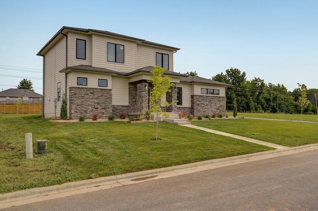 2153 E Will St, Republic, MO 65738 - view of front of home with stone siding, a front yard, and fence