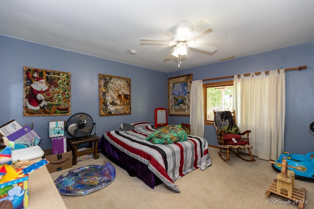 carpeted bedroom with ceiling fan