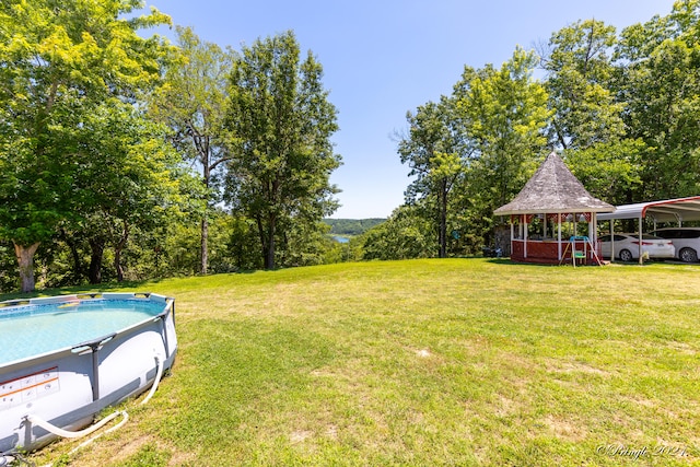 view of yard with a carport