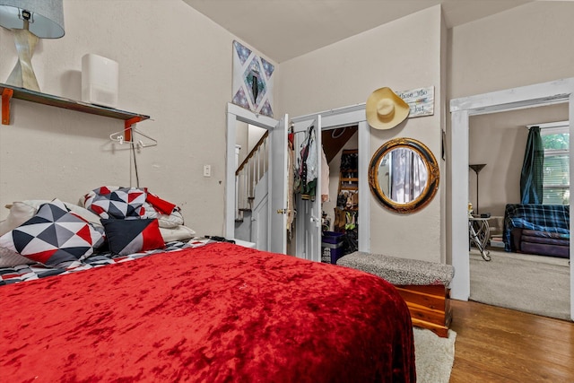 bedroom featuring hardwood / wood-style floors