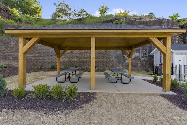 view of home's community with a gazebo and a patio area