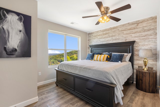 bedroom featuring ceiling fan and light wood-type flooring