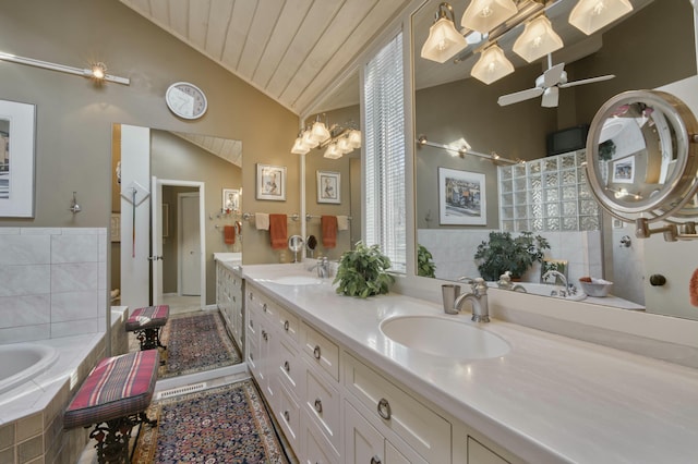 bathroom featuring ceiling fan, vanity, vaulted ceiling, wood ceiling, and independent shower and bath