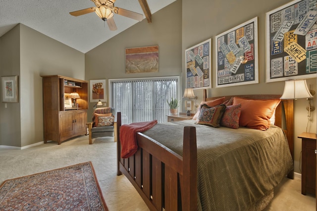 carpeted bedroom with ceiling fan and high vaulted ceiling