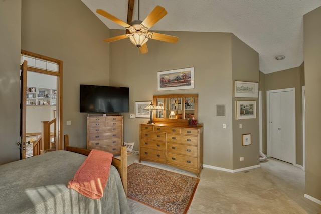 bedroom featuring high vaulted ceiling, ceiling fan, and light carpet