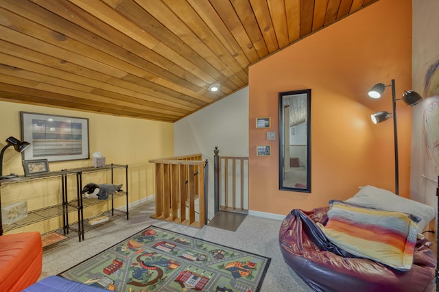 sitting room with vaulted ceiling and wooden ceiling