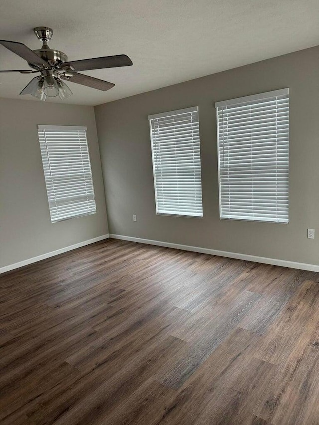 spare room with ceiling fan and hardwood / wood-style floors