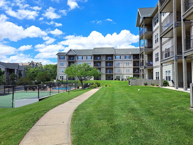 view of community with a yard