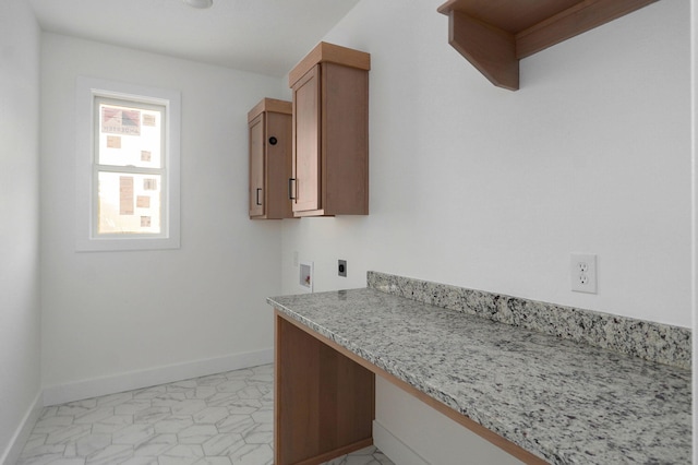 interior space with light stone countertops