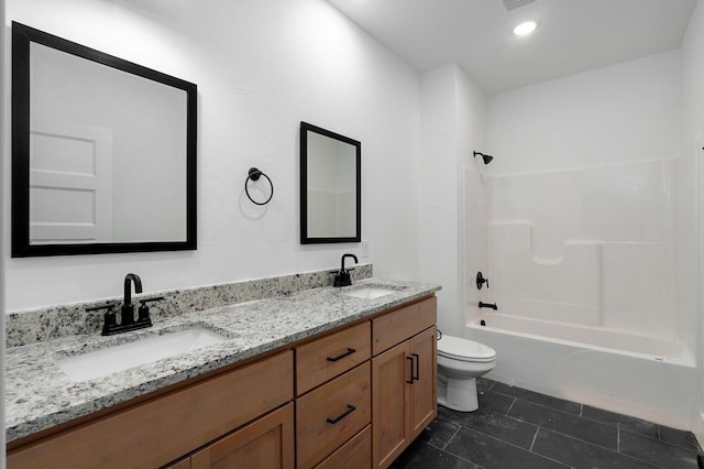 full bathroom with tile patterned floors, vanity, toilet, and bathing tub / shower combination