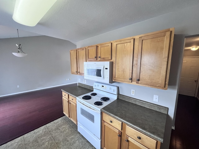 kitchen featuring pendant lighting, white appliances, vaulted ceiling, and a textured ceiling