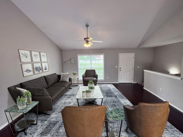 living room featuring ceiling fan and lofted ceiling