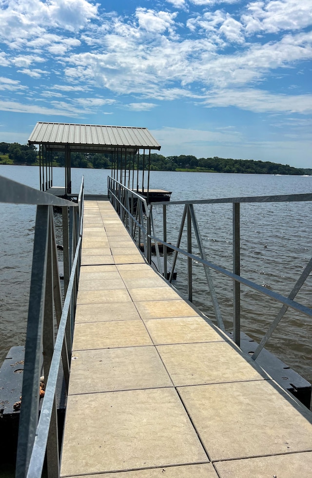 view of dock with a water view