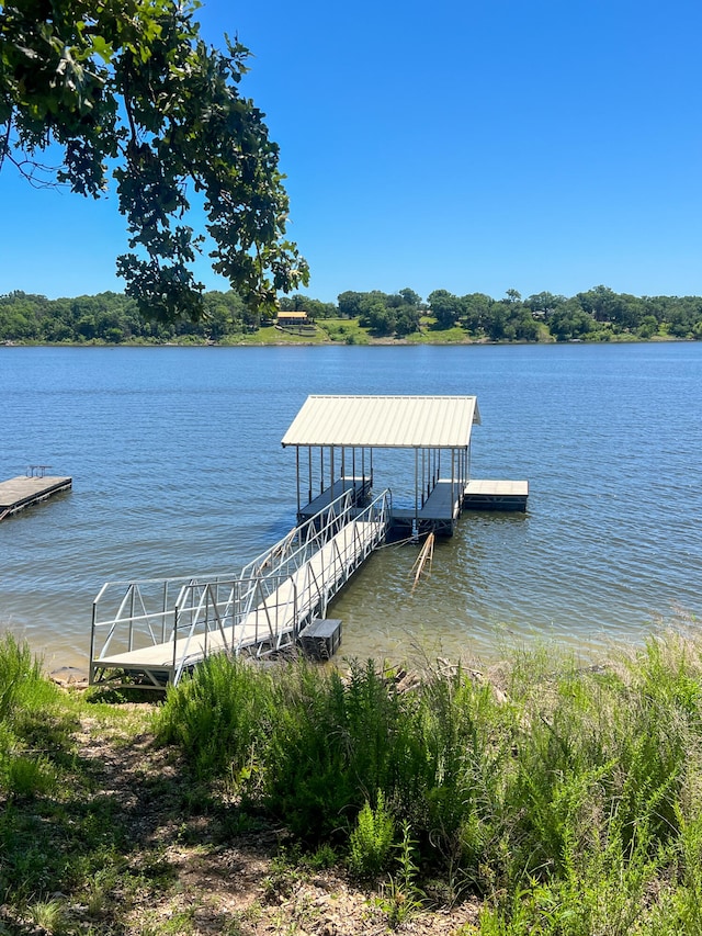 view of dock with a water view