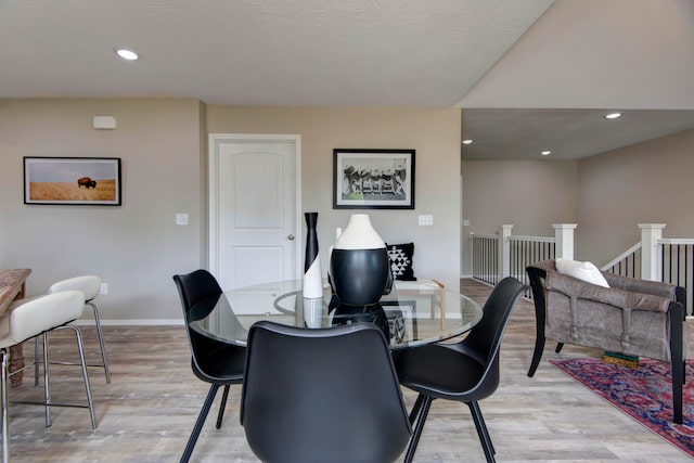 dining area with light hardwood / wood-style flooring