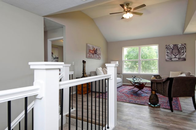 interior space featuring lofted ceiling and wood-type flooring