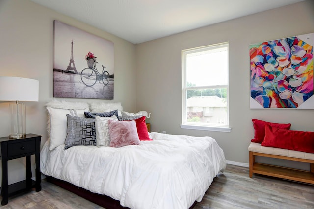 bedroom featuring hardwood / wood-style flooring