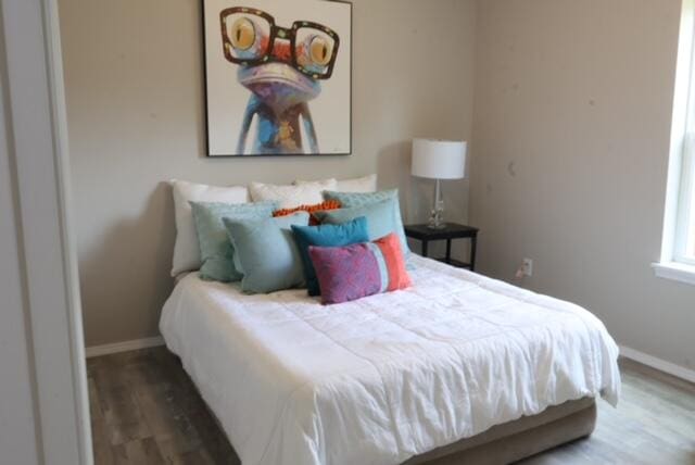 bedroom featuring hardwood / wood-style floors