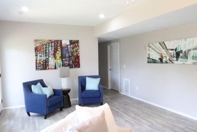 living area featuring light wood-type flooring