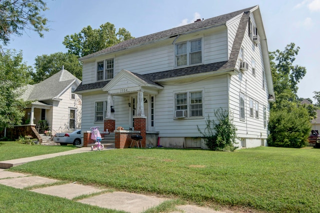 view of front facade featuring a front yard