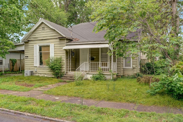 view of front of home featuring central AC unit and covered porch