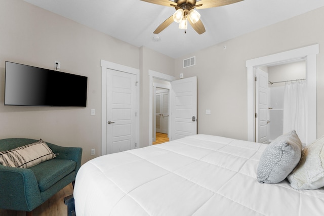 bedroom featuring ceiling fan and hardwood / wood-style floors