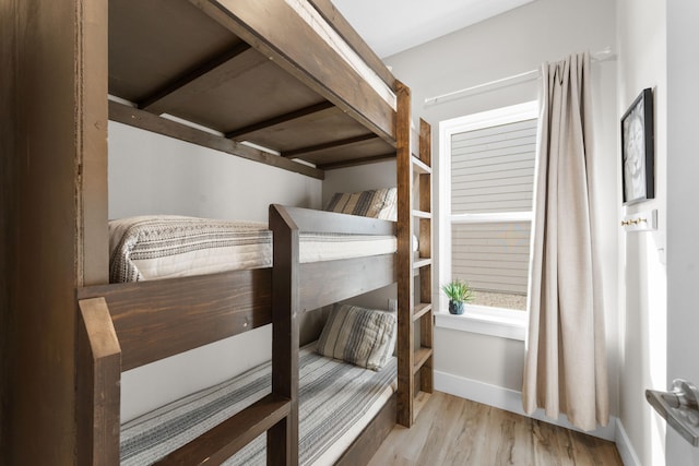 bedroom with light hardwood / wood-style floors