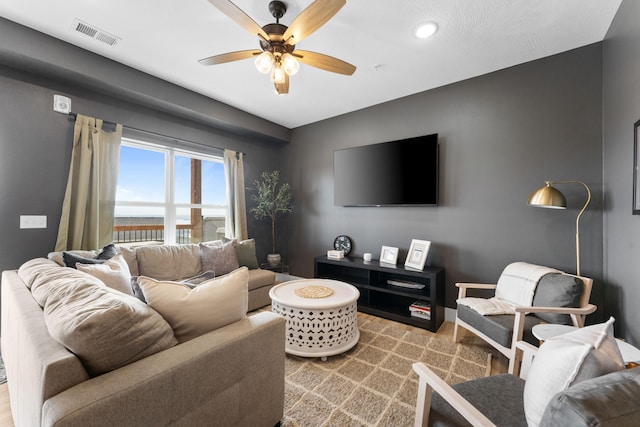 living room with ceiling fan