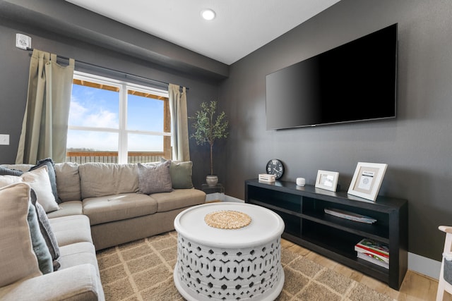 living room with light hardwood / wood-style flooring