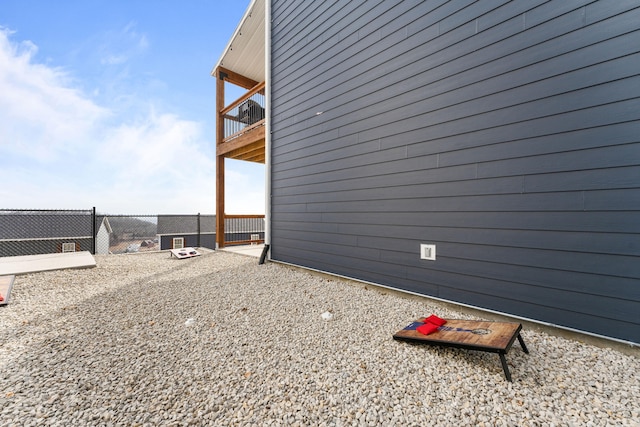 view of side of home featuring a patio