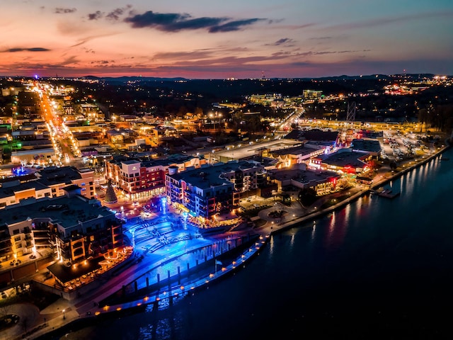 aerial view at dusk with a water view