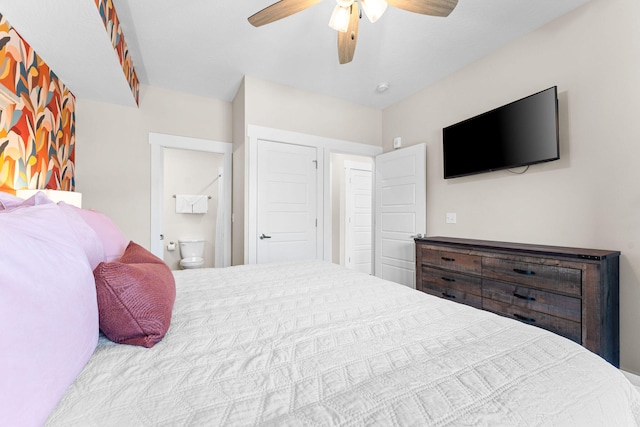 bedroom featuring ensuite bathroom and ceiling fan